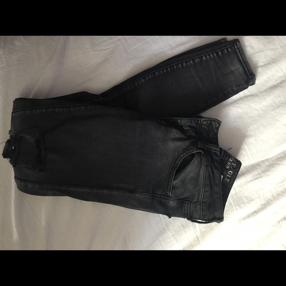 black ripped american eagle jeans